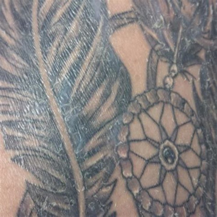 Can I use Savlon on a new tattoo?